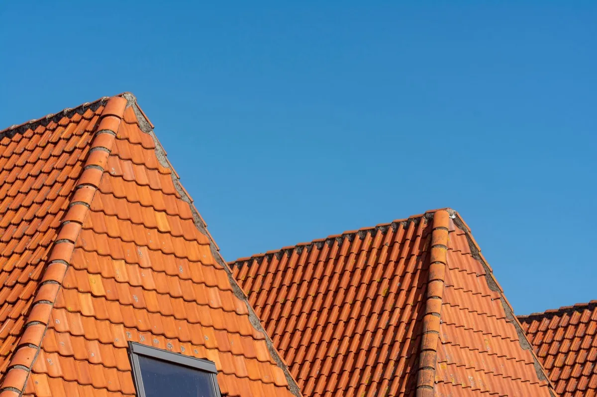 Clay barrel tile rooflines on homes in San Angelo, TX