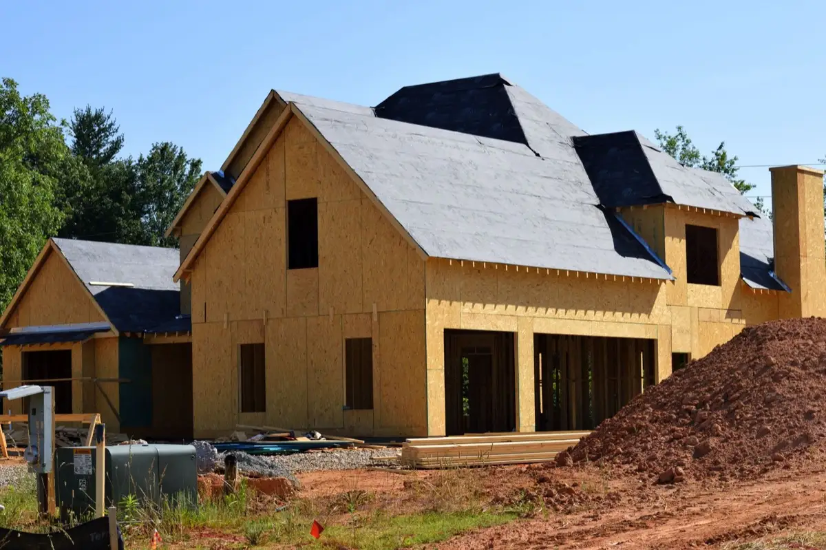 House with new roof decking and synthetic underlayment during a roof replacement in San Angelo, TX