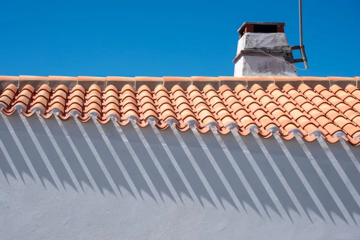 Roof ridge line and chimney on a home in San Angelo, TX