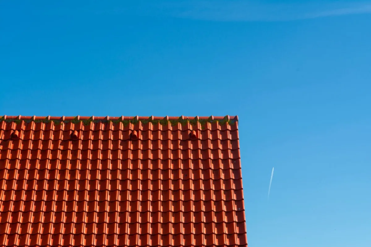 Tile roof gable in full sun, the kind of exposure that sets roof life in San Angelo, TX